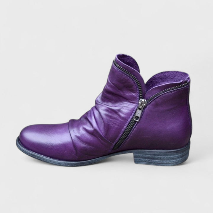 Marisol purple slouch ankle boot with side zipper, side view