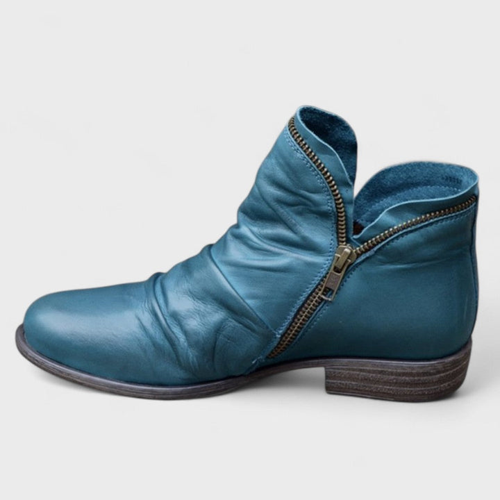 Marisol teal slouch ankle boot with side zipper, side view