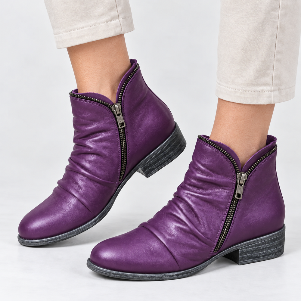 Marisol purple slouch ankle boots, side profile on model