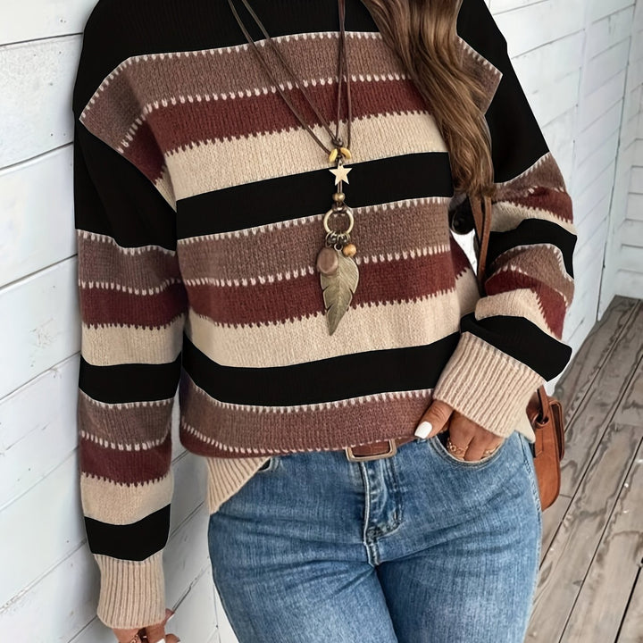 Odessa striped oversized sweater, side view showing sleeve and hem detail
