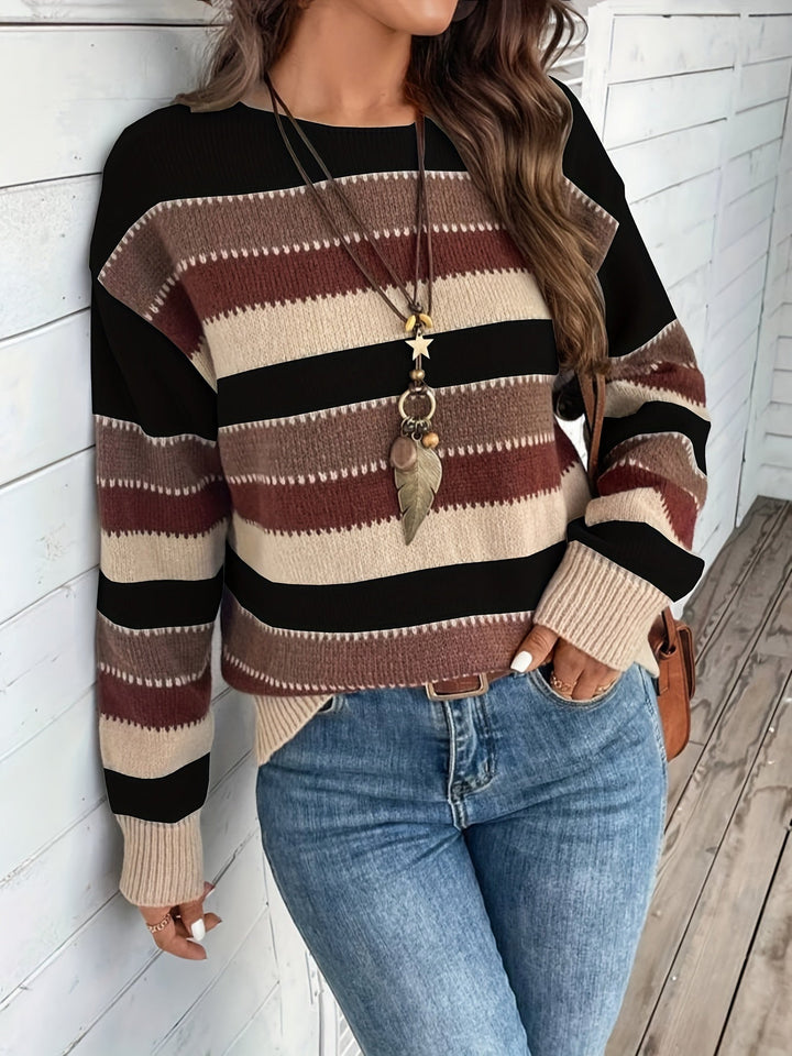 Odessa striped oversized sweater, side view showing sleeve and hem detail