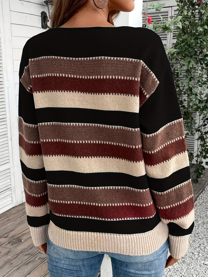 Odessa striped oversized sweater, side view showing sleeve and hem detail