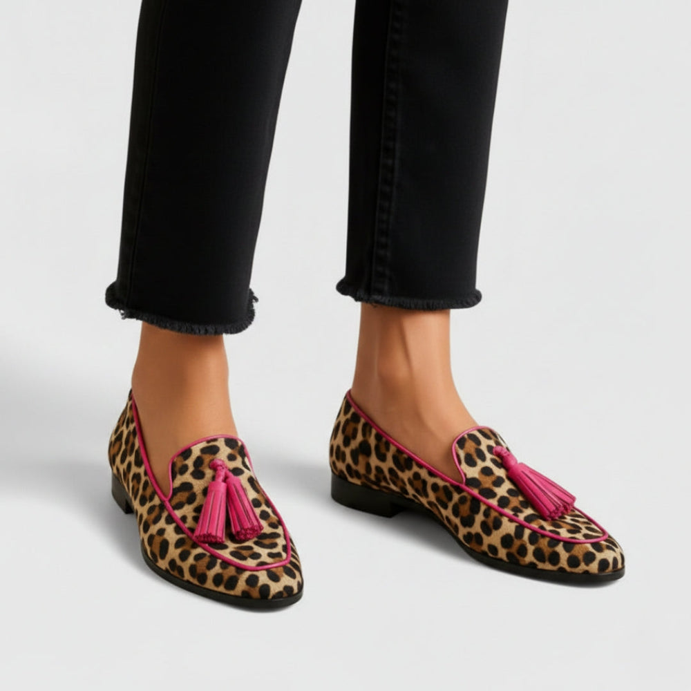 Marguerite printed loafers with pink tassels, close-up front view