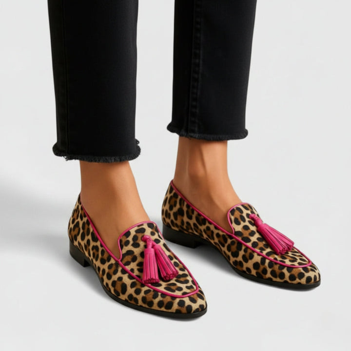 Marguerite loafers styled with cropped black jeans, angled view