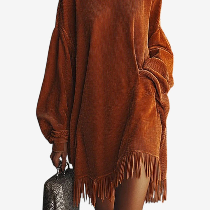 Marielle fringe hem detail on sweater dress, side view