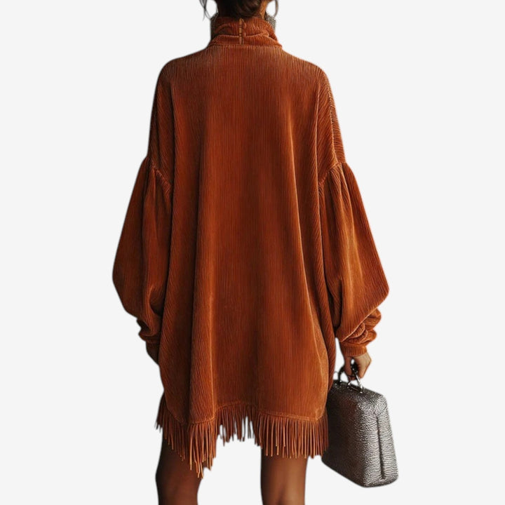 Marielle turtleneck sweater dress, back view with fringe hem
