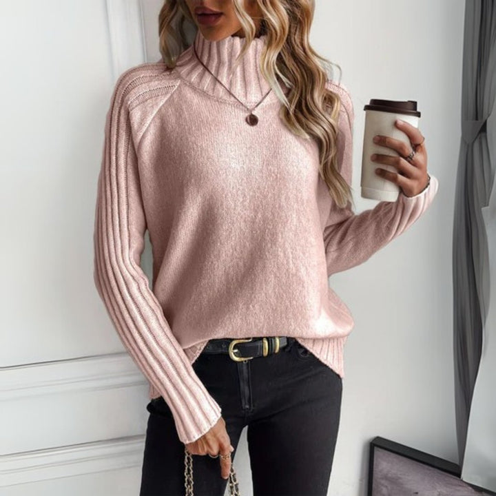 Rosalie pink turtleneck ribbed sleeve sweater, styled with jeans