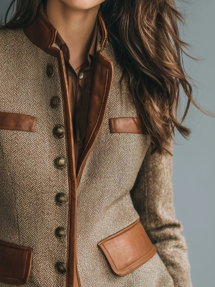 Pemberly tweed jacket showing leather-trim lapel and button closure