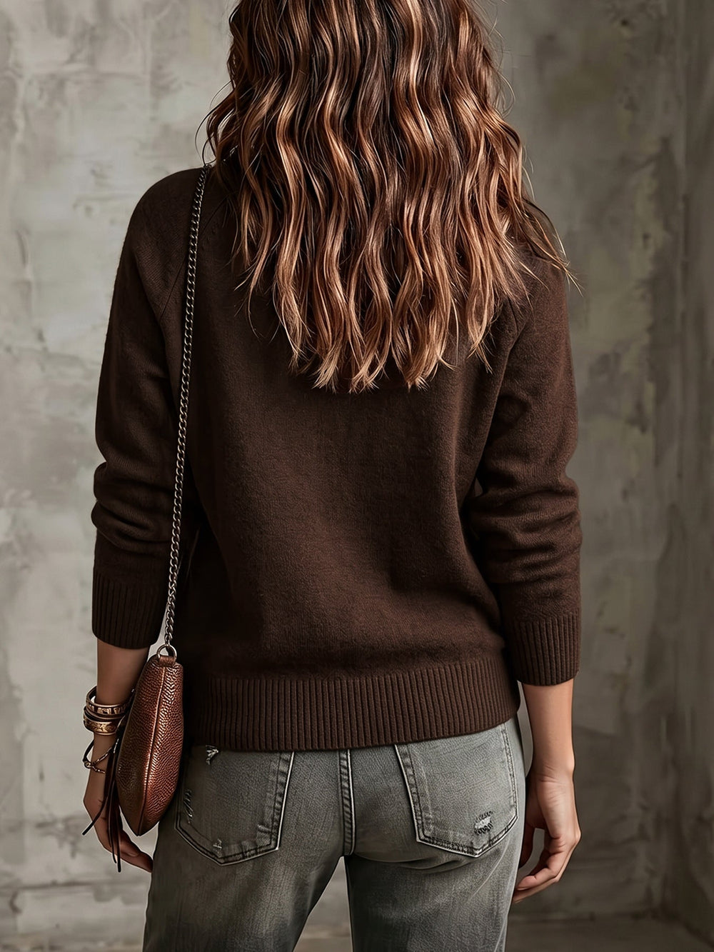 Verity brown cardigan, back view with ribbed hem