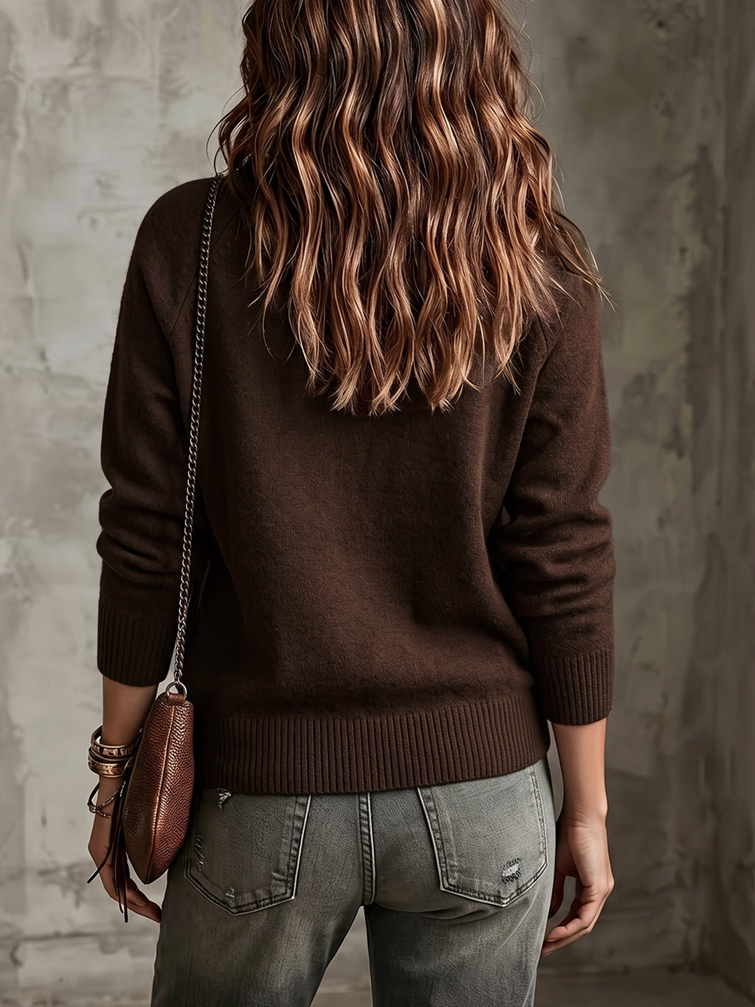 Verity brown cardigan, back view with ribbed hem