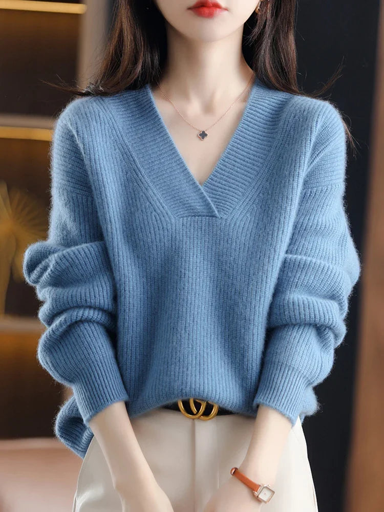 Marisabel beige V-neck sweater styled with belt, close-up