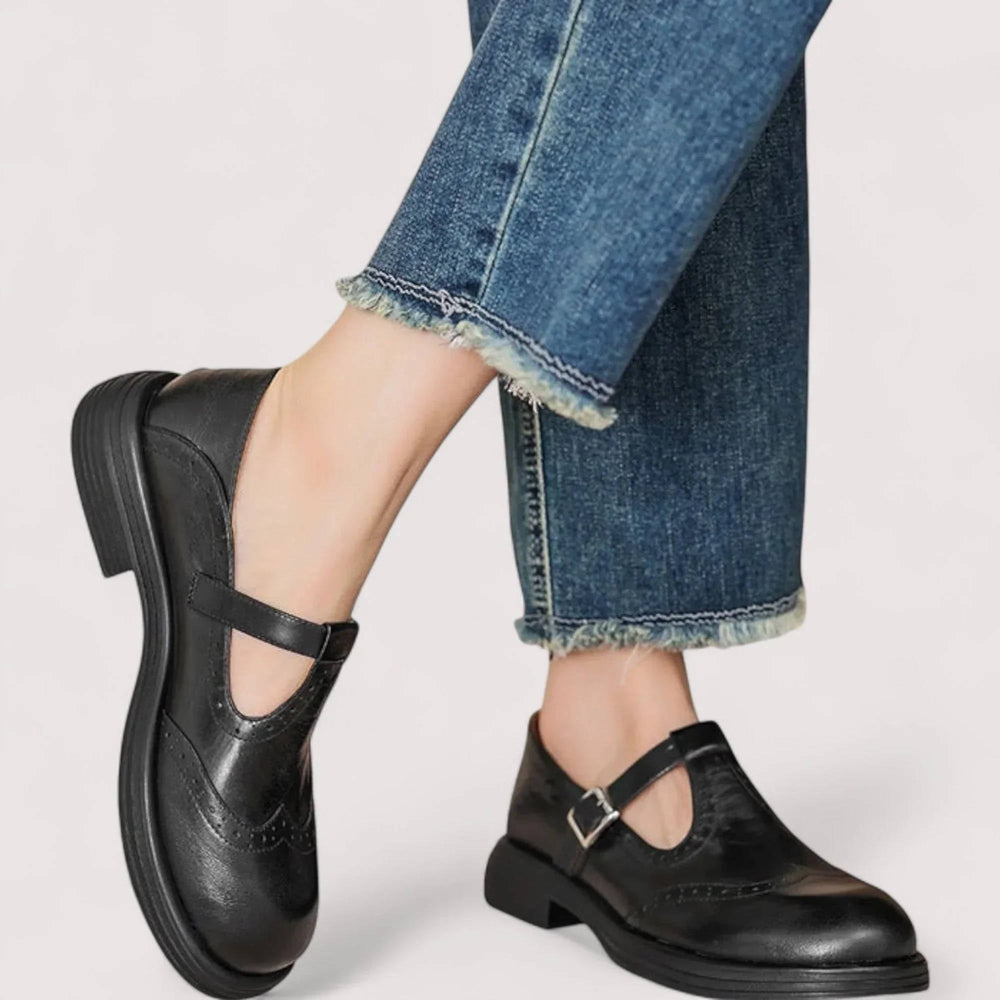 Carolina T-strap Mary Jane shoes worn with jeans, side view