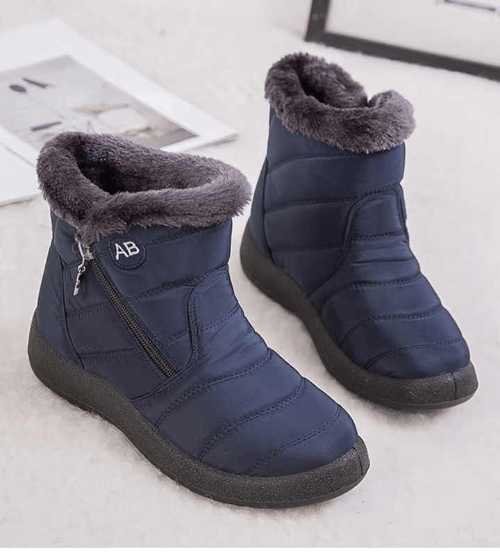Marcelline navy ankle snow boots with zipper detail, pair shot