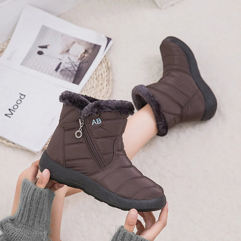 Marcelline brown waterproof snow boots, worn on foot