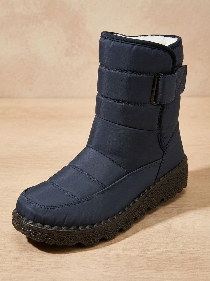 Marisol navy mid-calf snow boot, side angle view