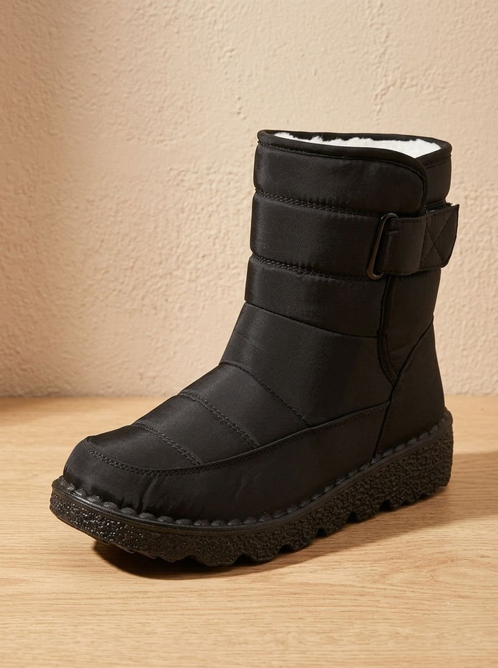 Marisol navy mid-calf snow boot, side angle view