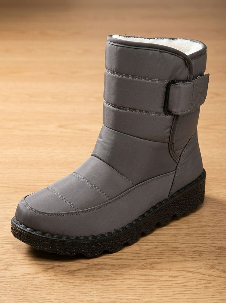 Marisol navy mid-calf snow boot, side angle view