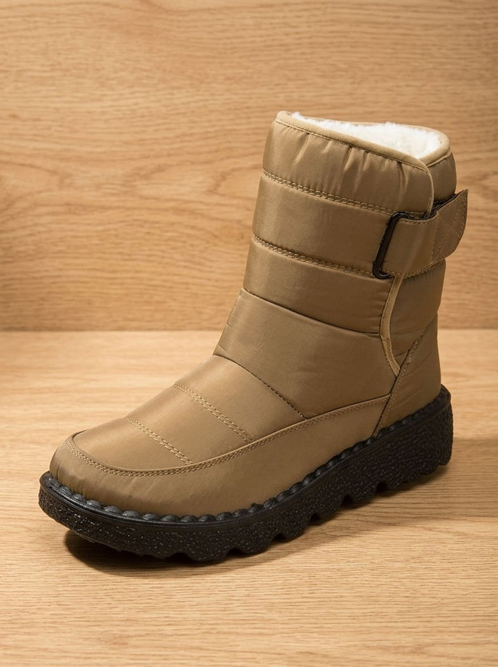 Marisol navy mid-calf snow boot, side angle view