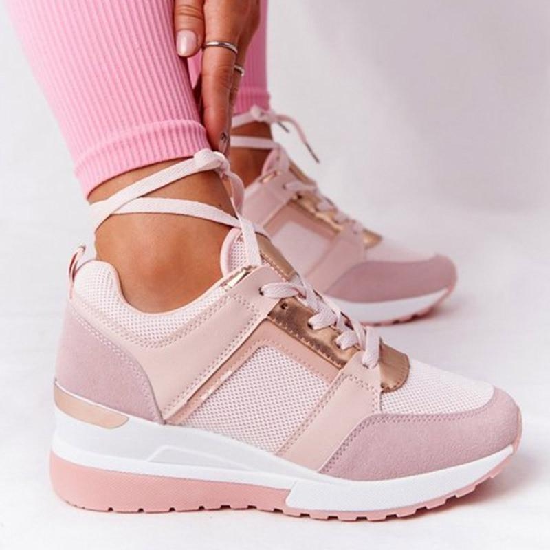 Georgette pink wedge lace-up platform sneakers, close-up on model