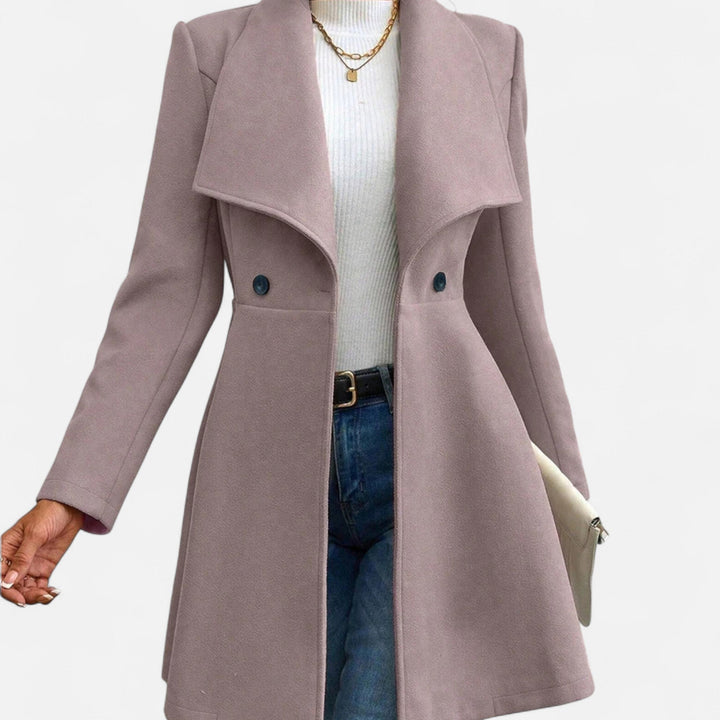 Thessaly wide collar midi coat in tan, front view with hand in pocket