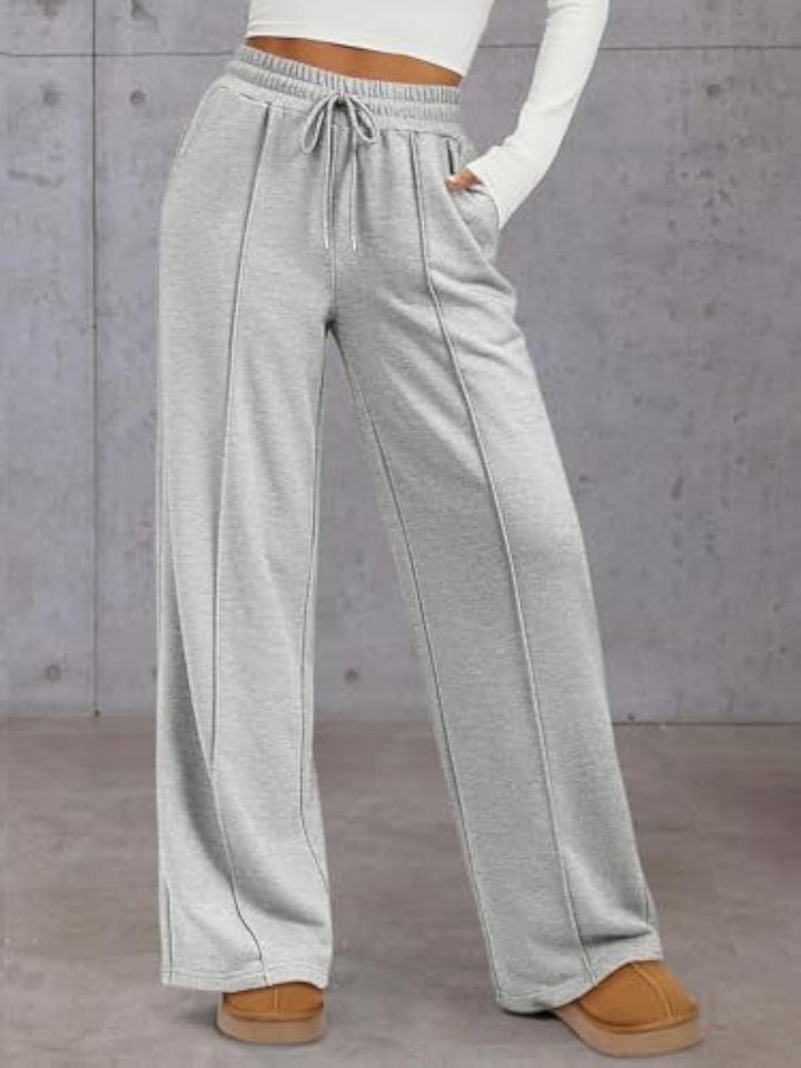 Vienna wide leg sweatpants in pink, front view with hand in pocket