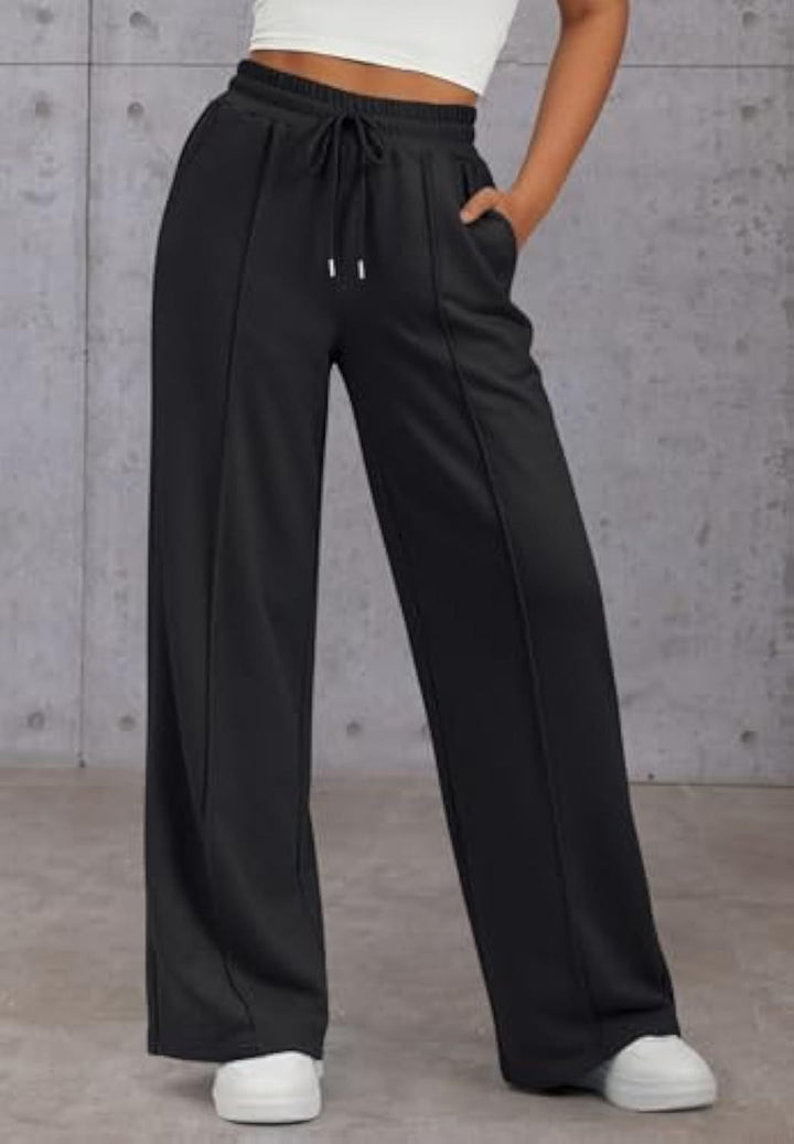 Vienna wide leg sweatpants in pink, front view with hand in pocket