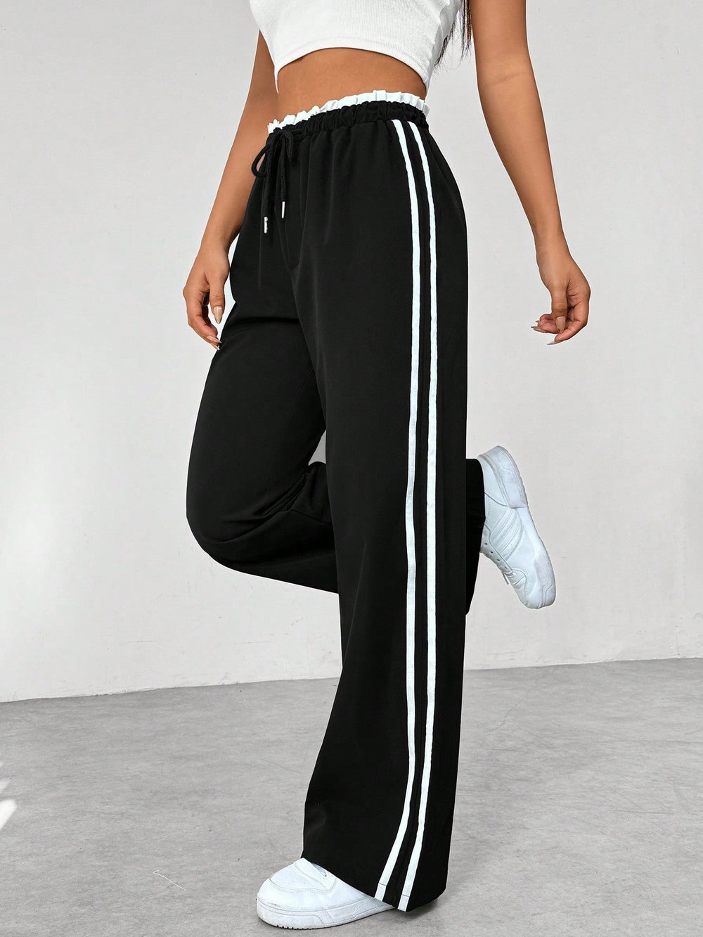 Rosalie wide leg side stripe sweatpants in black, side view