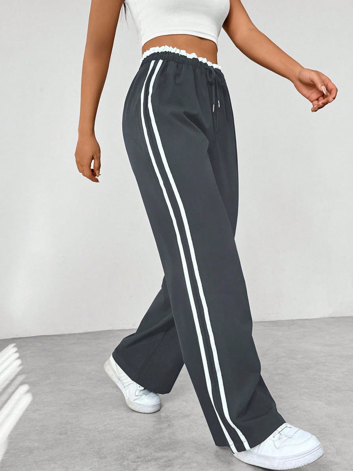 Rosalie wide leg side stripe sweatpants in dark gray, side view