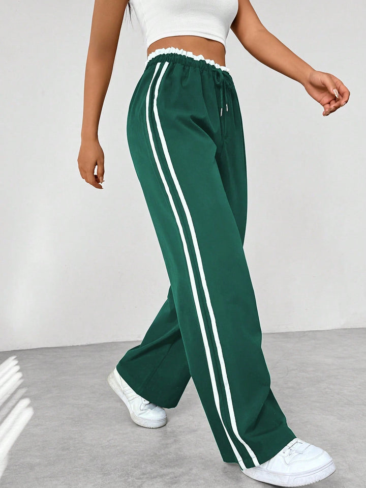 Rosalie wide leg side stripe sweatpants in white, side view