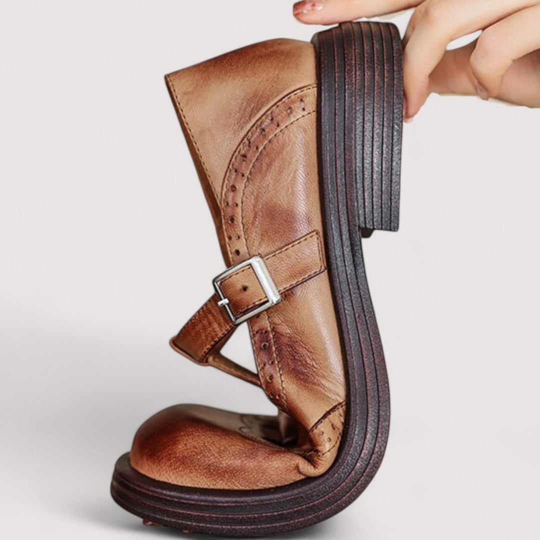 Close-up side view of Bettina Mary Jane shoe showing buckle strap and stacked heel