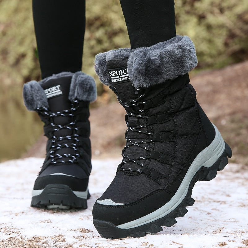 Odessa black fleece snow boots worn outdoors, front view