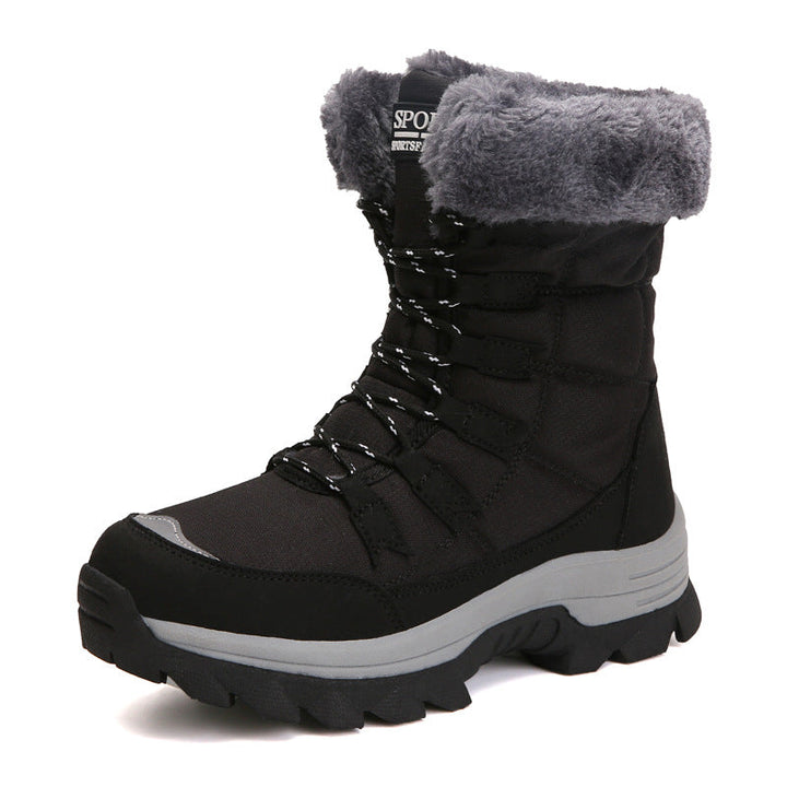 Odessa black fleece snow boots worn outdoors, front view
