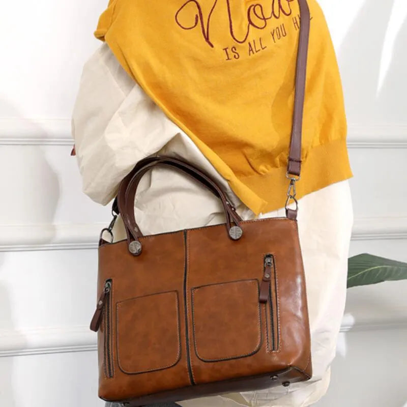 Marguerite tote bag worn crossbody over shoulder