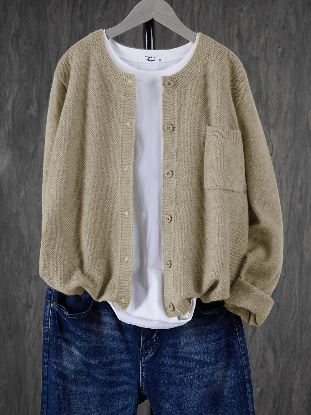 Wren relaxed button-front cardigan in light brown, front view on hanger
