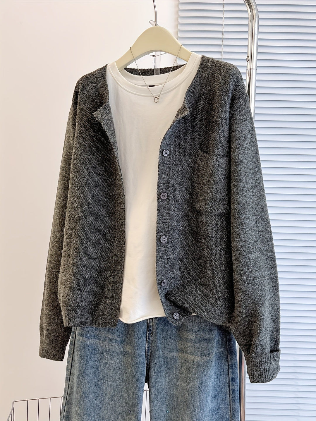 Wren relaxed button-front cardigan in grey, front view on hanger
